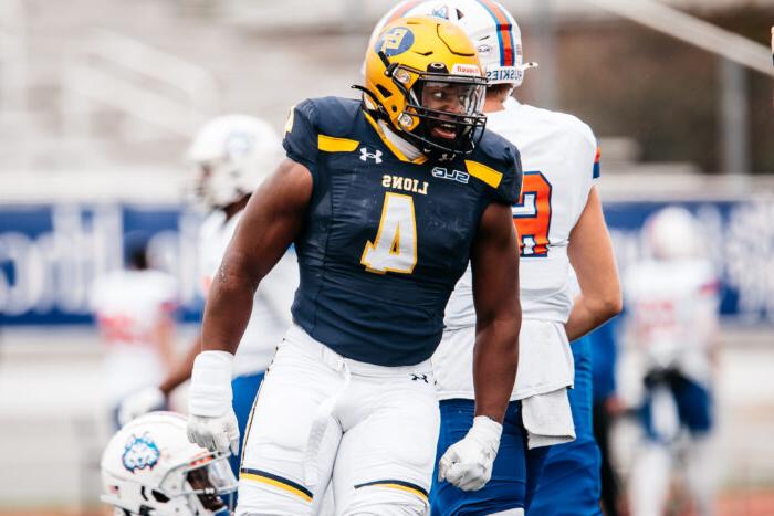 A football player in uniform during a game.